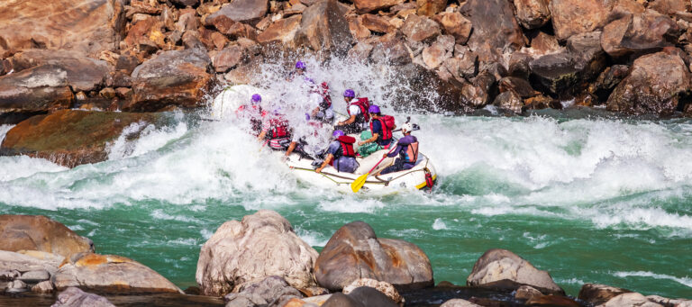 People on a white water rafting trip